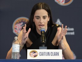 Indiana Fever's Caitlin Clark speaks during a news conference.