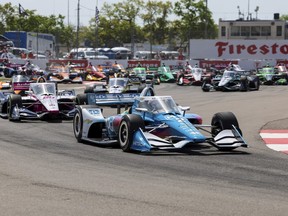 Pole sitter Team Penske driver Josef Newgarden leads the pack into turn 2 after the start of the IndyCar Firestone Grand Prix of St. Petersburg.