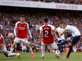 Tottenham's Richarlison, right, attempts a shot at goal against Arsenal earlier this season.