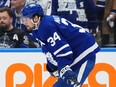 Toronto Maple Leafs' Auston Matthews reacts after Boston Bruins' Brad Marchand scored an empty-net goal in Game 3.