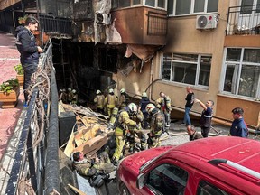 Firefighters work after a fire broke out at a nightclub in Istanbul, Turkey, Tuesday, April 2, 2024.