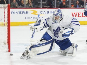 Ilya Samsonov of the Toronto Maple Leafs looks on at the puck.