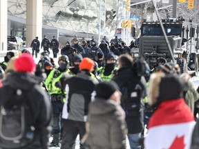 So-called Freedom Convoy protesters are shown in Ottawa on Feb. 18, 2022. (Jean Levac/Postmedia Network)
