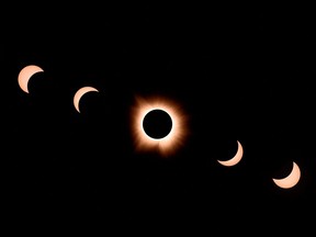 In this composite of photographs, the moon passes by the sun during a total solar eclipse.
