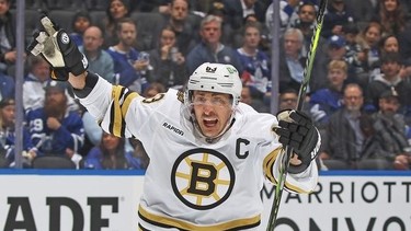 Brad Marchand #63 of the Boston Bruins celebrates a goal by Jake DeBrusk (not shown) against the Toronto Maple Leafs in Game Three of the First Round of the 2024 Stanley Cup Playoffs at Scotiabank Arena on April 24, 2024 in Toronto.. The Bruins defeated the Maple Leafs 4-2.