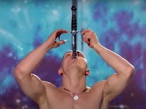Sword-swallowing performer Alex Magala.