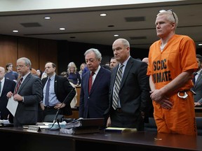 Alex Murdaugh, convicted of killing his wife, Maggie, and younger son, Paul, in June 2021, stands with his defence team during a hearing on a motion for a retrial, Jan. 16, 2024, at the Richland County Judicial Center in Columbia, S.C.