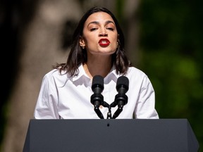 U.S. Rep. Alexandria Ocasio-Cortez speaks before U.S. President Joe Biden takes the stage on Earth Day at Prince William Forest Park in Triangle, Va., Monday, April 22, 2024.