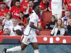 Real Madrid's Aurelien Tchouameni celebrates after scoring the opening goal during a Spanish La Liga soccer match between Mallorca and Real Madrid at the Son Moix stadium in Palma de Mallorca, Spain, Saturday, April 13, 2024.