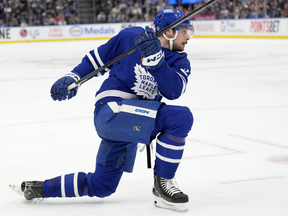 Maple Leafs centre Auston Matthews takes a shot during second period NHL action against the Red Wings, in Toronto, Saturday, April 13, 2024.