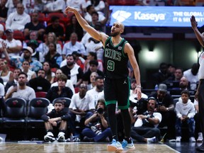 Derrick White of the Boston Celtics reacts after making a basket against the Miami Heat during the fourth quarter in Game 4 of the Eastern Conference First Round Playoffs at Kaseya Center on April 29, 2024 in Miami, Fla.