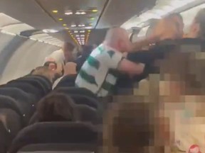 An unruly passenger aboard an Easyjet flight from Scotland to Turkey was filmed punching airline crew and police in Turkey over the weekend.