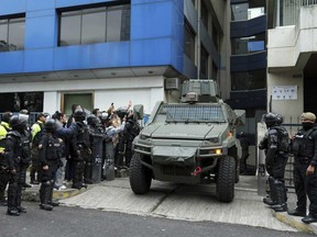 A military vehicle transports former Ecuadorian Vice President Jorge Glas from the detention center where he was held after police broke into the Mexican Embassy to arrest him in Quito, Ecuador, Saturday, April 6, 2024.
