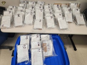 Searches of a home and a vehicle in Toronto allegedly led to the seizure 60 kilos of cocaine,13 kilos of meth, 19 handguns, one assault rifle, 3,000 rounds of ammo, 53 magazines, four drum magazines, 66 Glock auto switches, three bullet proof vests and one ballistic helmet.