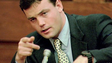 John Wayne Bobbitt points during testimony on the sixth day of his wife Lorena Bobbitt's malicious wounding trial at the Prince William Courthouse in Manassas, VA 19 January 1994.