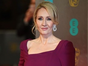 British author J. K. Rowling poses upon arrival at the BAFTA British Academy Film Awards at the Royal Albert Hall in London on February 12, 2017.