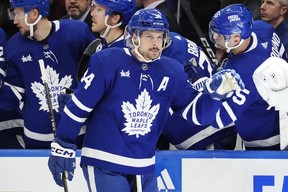 Maple Leafs' Auston Matthews celebrates his goal against the Pittsburgh Penguins during the third period in Toronto on Monday, April 8, 2024.