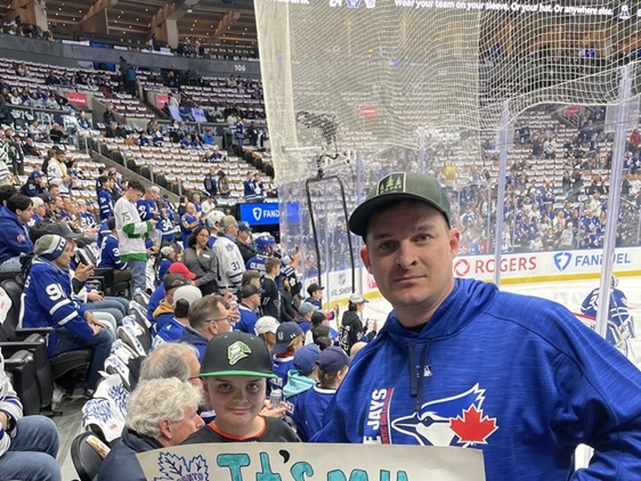  Carter Hoyles and his dad Eric celebrate Carter’s ninth birthday in style — at a Leafs playoff game. JOE WARMINGTON/TORONTO SUN