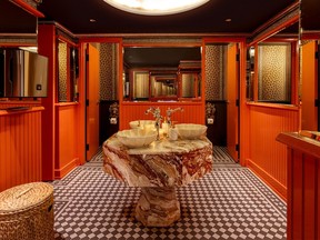 Washroom inside Piano Piano on Colborne St. in Toronto, awarded with two fleurs in Cashmere’s UltraLuxe Bathroom Guide.