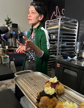Sahar Delmoradi, owner of 5S Cafe on Denison St., speaks about recent incidents of gun violence after a triple shooting on Queen St. W. on Thursday, April 11, 2024.