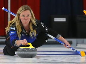 Chelsea Carey delivers a rock during the 43rd Autumn Gold Curling Classic in Calgary on Oct. 9, 2021.