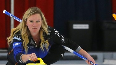 Chelsea Carey delivers a rock during the 43rd Autumn Gold Curling Classic in Calgary on Oct. 9, 2021.