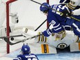Boston Bruins goaltender Jeremy Swayman makes a save