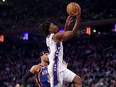 Tyrese Maxey of the Philadelphia 76ers heads for the net as Josh Hart of the New York Knicks defends during the first half at Madison Square Garden on April 30, 2024 in New York City.