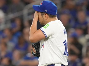 Blue Jays starting pitcher Yusei Kikuchi reacts during second inning MLB action against the Dodgers in Toronto, Saturday, April 27, 2024.