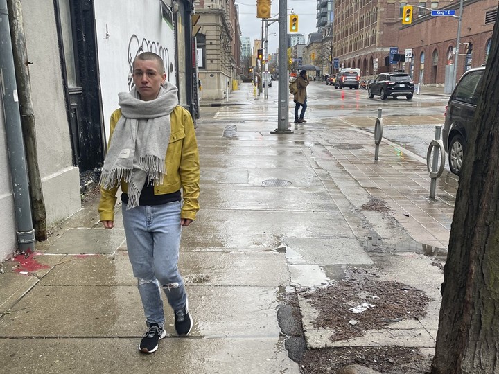  Businesswoman Andrea Balmaceda says she always keeps an eye on her surroundings when she’s walking downtown. JOE WARMINGTON