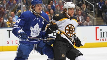 Maple Leafs' Auston Matthews (left) and Bruins' David Pastrnak mix it up at Scotiabank Arena on Oct. 19, 2019 in Toronto.