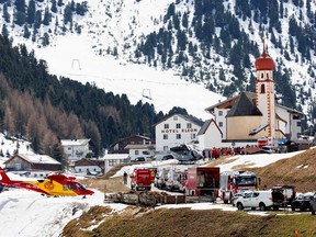 Rescue teams prepare for an avalanche operation in the village of Vent in the Oetztal valley on April 11, 2024 near Vent, Austria.