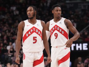 Immanuel Quickley and RJ Barrett of Mississauga, Ont., will likely return to the Toronto Raptors lineup on Tuesday. Quickley and Barrett (9) are seen on the court during first half NBA basketball action against the Cleveland Cavaliers, in Toronto, Monday, Jan. 1, 2024.