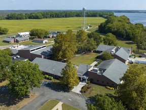 FILE - This aerial image taken with a drone shows Cumberland Hospital for Children and Adolescents, Tuesday Sept. 20, 2022, in New Kent, Va. The former longtime medical director of the hospital that serves vulnerable children used physical examinations as a "ruse" to sexually abuse two teenage patients, a prosecutor said Monday, April 22, 2024, while the physician's attorney "adamantly" denied any inappropriate conduct.