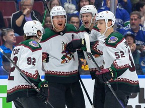 Josh Brown #3 of the Arizona Coyotes is congratulated after scoring a goal against the Vancouver Canucks during the second period of their NHL game at Rogers Arena on April 10, 2024 in Vancouver.