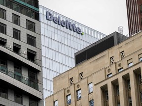 Deloitte signage is pictured in the financial district in Toronto, Friday, Sept. 8, 2023.