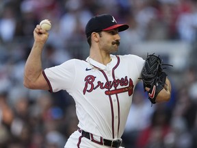 Atlanta Braves pitcher Spencer Strider (99) delivers in the first inning of baseball game against the Arizona Diamondbacks Friday, April 5, 2024, in Atlanta.