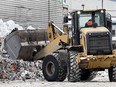 Canada's environment commissioner says most federal programs aimed at reducing plastic waste are working, but the government isn't tracking its progress toward the goal of zero waste. A loader scoops up recyclable materials at a recycling facility in Montreal, Thursday, February 2, 2023.