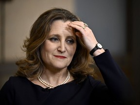 Deputy Prime Minister and Minister of Finance Chrystia Freeland waits for the start of a TV interview after tabling the federal budget on Parliament Hill in Ottawa, on Tuesday, April 16, 2024.