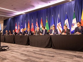 Canada's provincial and territorial leaders look on during a press conference at the meeting of the Council of the Federation, in Halifax, Monday, Nov. 6, 2023.