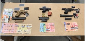 Firearms, currency seized