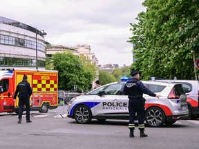 French police officers take part in a security perimiter near the consulate of Iran in Paris, as a person was suspected of entering the building with explosives, on April 19, 2024.