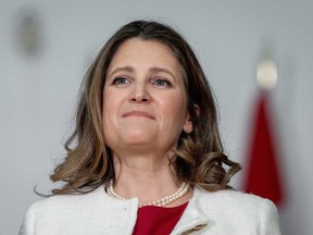 Finance Minister Chrystia Freeland listens to a speaker during a news conference in Vancouver on Wednesday, March 27, 2024.