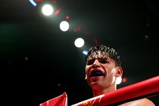 Ryan Garcia reacts after their WBC Super Lightweight title bout against Devin Haney at Barclays Center on April 20, 2024 in New York City.