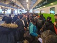 Crowd at Toronto Union Station waiting to get onto GO train headed to Niagara Falls to catch solar eclipse.