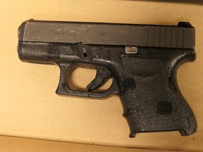 Halton Regional Police say officers seized a handgun while arresting a group of alleged carjackers. (Police handout)