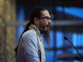 Jason Alsop (Gaagwiis), president of the Haida Nation, speaks during an announcement in Vancouver, on Tuesday, Feb. 7, 2023.