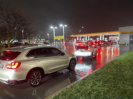 Drivers line up for gas before an expected double-digit price hike on Wednesday, April 17, 2024.