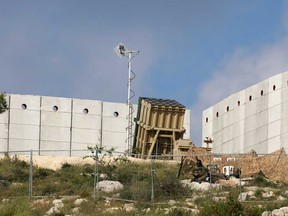 This picture shows a battery of Israel's Iron Dome air defence system deployed near Jerusalem on April 15, 2024.