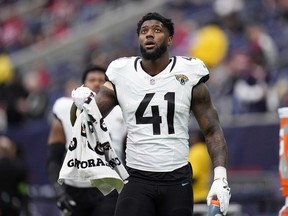 FILE -Jacksonville Jaguars linebacker Josh Allen (41) during an NFL football game against the Houston Texans Sunday, Nov. 26, 2023, in Houston. A person familiar with negotiations, Wednesday, April 10, 2024, says Allen and the Jacksonville Jaguars have reached agreement on a five-year, $150 million contract that includes $88 million guaranteed. The person spoke to The Associated Press on condition of anonymity because the deal had not officially been signed or announced.